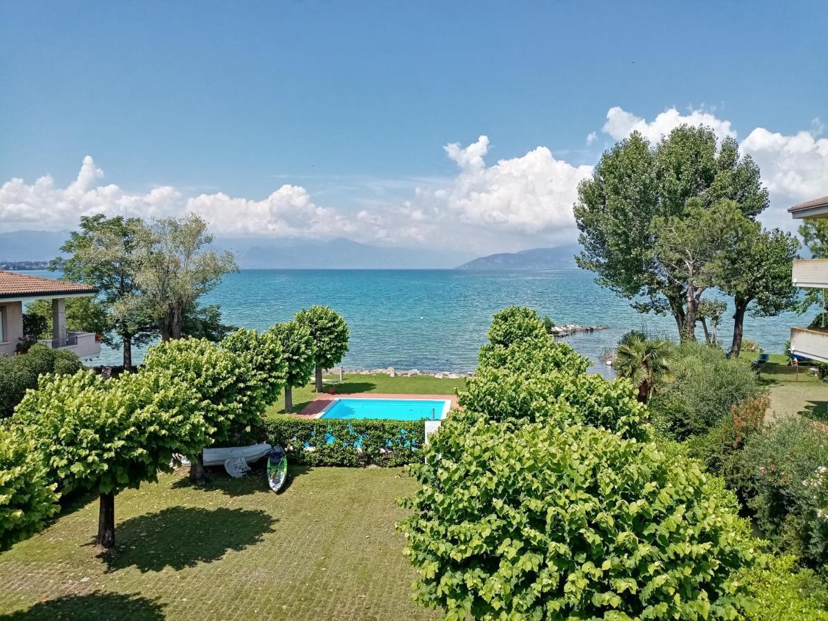 Casa Lugana 15 - Monolocale Con Piscina Fronte Lago Sirmione Bagian luar foto
