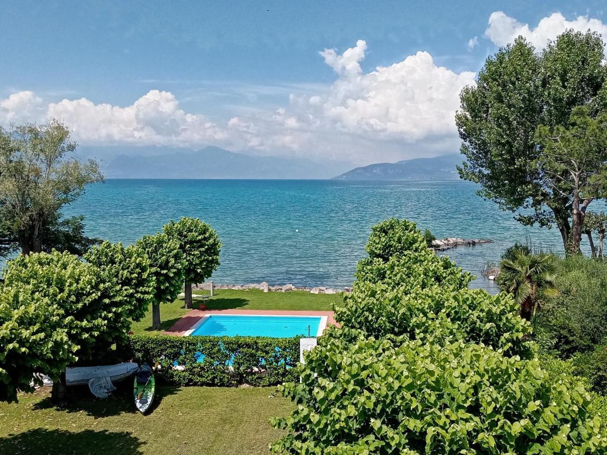 Casa Lugana 15 - Monolocale Con Piscina Fronte Lago Sirmione Bagian luar foto