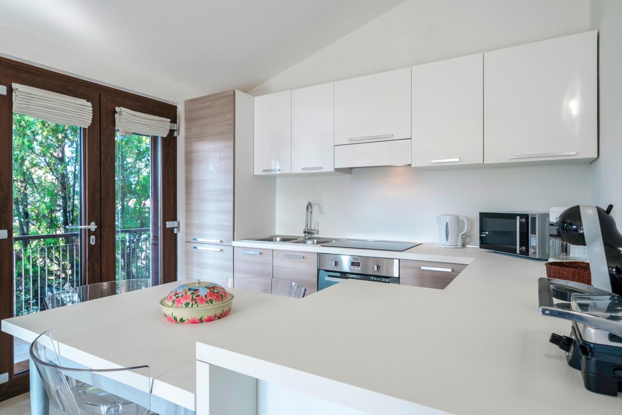 Casa Lugana 15 - Monolocale Con Piscina Fronte Lago Sirmione Bagian luar foto